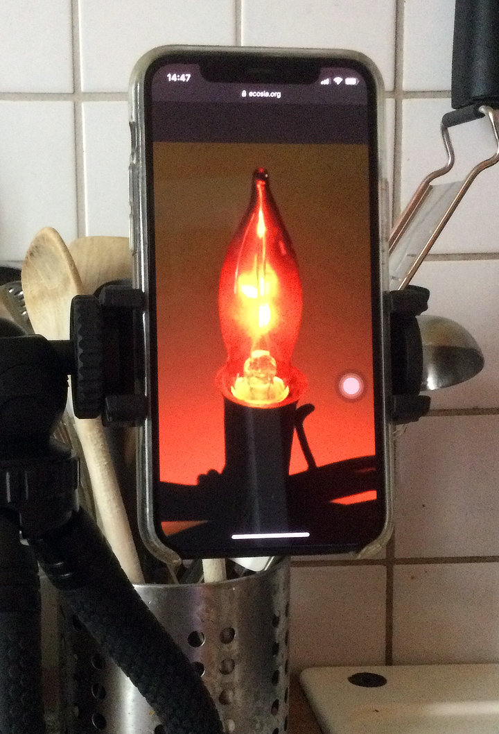 Bild Mobiltelefon mit Kerzenbild